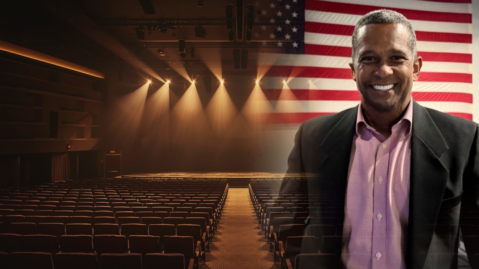 Hamilton Galdino in front of an auditorium set up for a talk